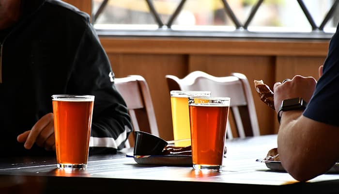 Two friends enjoying a pint of ale in the Foundary restaurant in Blackburn