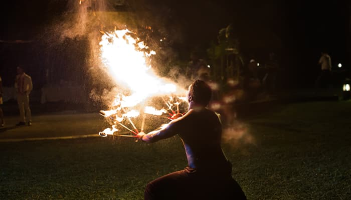 Fire artist breathing fire